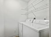 Thumbnail 12 of 30 - In-Unit Laundry Room at Eden Commons, Eden Prairie, MN