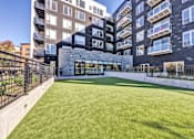 Thumbnail 52 of 61 - Large grassy area for pet at The Mera, St Louis Park, MN, Minnesota