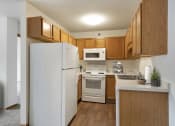 Thumbnail 2 of 26 - Fully Furnished Kitchen at Pebblebrook Court, Minnesota, 55437