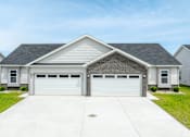 Thumbnail 35 of 37 - A two-car garage is attached to a house.at Concord Crossing, Lafayette, 47909  