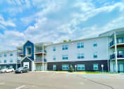 Thumbnail 9 of 14 - our apartments offer a parking lot for your car at Murdock Gardens Apartments, Lafayette, IN 47904