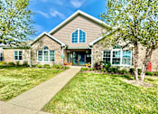 Thumbnail 1 of 41 - a house with a sidewalk and trees in front of it at Hawthorne Properties in Lafayette, IN 47905
