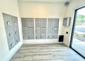 Thumbnail 2 of 14 - a lockers in a room with a large window at Murdock Gardens Apartments, Lafayette, IN 47904