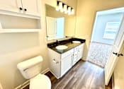 Thumbnail 9 of 37 - A bathroom with a toilet, sink, and mirror.at Concord Crossing, Lafayette  