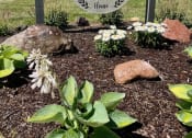 Thumbnail 4 of 14 - a welcome sign in the front yard of a home at Shenandoah Properties in Lafayette, IN 47905