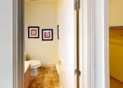 Thumbnail 12 of 28 - a bathroom with a toilet and a sink