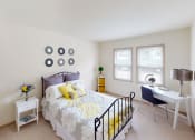 Thumbnail 11 of 28 - two windows in a bedroom with a bed and desk