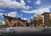 Thumbnail 9 of 22 - a rendering of a building with cars in a parking lot