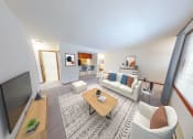 Thumbnail 5 of 35 - a living room with a couch and a tv