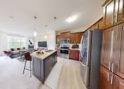 Thumbnail 1 of 64 - a large kitchen and living room with a table and chairs