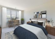 Thumbnail 41 of 64 - an open bedroom with a bed and a desk with a window