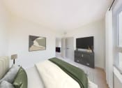 Thumbnail 28 of 64 - the master bedroom has a large bed and a tv in the corner