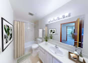 Thumbnail 39 of 42 - a bathroom with a sink and a toilet and a mirror
