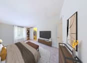 Thumbnail 8 of 37 - A bedroom with a large bed and a television in the corner.