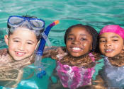 Thumbnail 21 of 28 - a group of children swimming in a pool