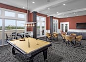 Thumbnail 10 of 25 - our apartments showcase a naturally well lit living room