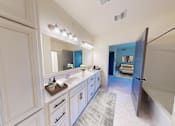 Thumbnail 21 of 46 - Large Attached Bath with Ample Linen Cabinets and Storage