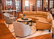 Thumbnail 16 of 21 - a living room filled with furniture and a rug