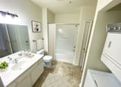 Thumbnail 8 of 26 - a bathroom with a toilet sink and shower