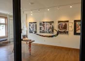 Thumbnail 16 of 53 - a view of an art gallery with paintings on the wall
