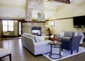 Thumbnail 14 of 21 - Clubhouse with fireplace and coffee bar