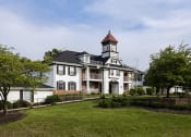 Thumbnail 19 of 19 - a large house with a clock tower on top of it