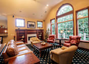 Thumbnail 25 of 59 - luxurious, rich, clubhouse with fireplace and comfy sitting area