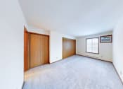 Thumbnail 14 of 50 - A room with a white ceiling and a window with a white frame.