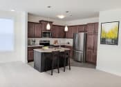 Thumbnail 16 of 64 - a kitchen with a center island and stainless steel refrigerator