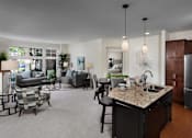 Thumbnail 8 of 53 - a kitchen and living room with a refrigerator