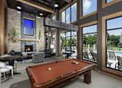 Thumbnail 13 of 53 - a clubhouse with a pool table and a fireplace