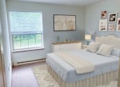 Thumbnail 18 of 22 - a bedroom with a bed and a window