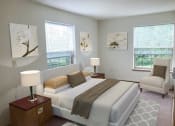 Thumbnail 15 of 22 - a bedroom with a bed and a chair and two windows