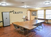 Thumbnail 6 of 22 - a conference room with a long wooden table and chairs