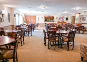 Thumbnail 5 of 22 - a dining room filled with tables and chairs in a restaurant
