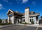 Thumbnail 33 of 53 - a view of the front of a building with a parking lot