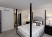 Thumbnail 46 of 53 - a bedroom with a large bed and two night stands