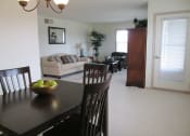 Thumbnail 9 of 28 - a view of the living room from the dining room