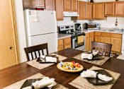 Thumbnail 17 of 42 - Kitchen with Dishwasher, Oven, Refrigerator, and Microwave