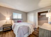 Thumbnail 14 of 47 - a bedroom with a bed and a closet