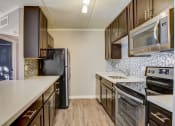 Thumbnail 25 of 111 - Apartment Home Kitchen at Woodland Ridge Apartments at 3420 Joann Lane in Woodridge IL