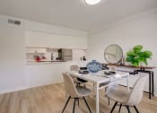 Thumbnail 5 of 31 - Renovated Dining Room at Captiva Club Apartments at 4401 Club Captiva Drive in Tampa, FL 33615