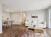 Thumbnail 24 of 77 - Living Room With Dining Area at CenterPointe Apartments & Townhomes, New York, 14424