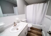 Thumbnail 16 of 54 - Renovated Apartment Home Bathrom at  Lincoln Square Apartments at 4055 Knoll Drive in Hamburg, NY