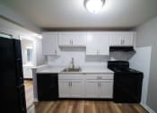 Thumbnail 6 of 54 - Renovated Apartment Home Kitchen at  Lincoln Square Apartments at 4055 Knoll Drive in Hamburg, NY