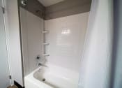 Thumbnail 17 of 54 - Renovated Apartment Home Bathrom at  Lincoln Square Apartments at 4055 Knoll Drive in Hamburg, NY