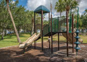 Thumbnail 20 of 31 - Playground at Captiva Club Apartments at 4401 Club Captiva Drive in Tampa, Florida 33615