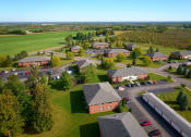 Thumbnail 46 of 50 - an aerial view of a neighborhood with houses and a parking lot at Centerpointe Apartments, Canandaigua, NY, 14424