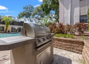 Thumbnail 42 of 46 - Outdoor Grilling Area at The Flats at Seminole Heights, Florida