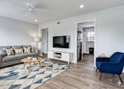 Thumbnail 7 of 42 - Spacious Living Area With TV at The Flats at Seminole Heights, Florida, 33603